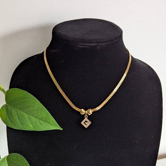 Givenchy Jewelry - ❌ SOLD ❌ Givenchy rhinestone G gold necklace with ribbon